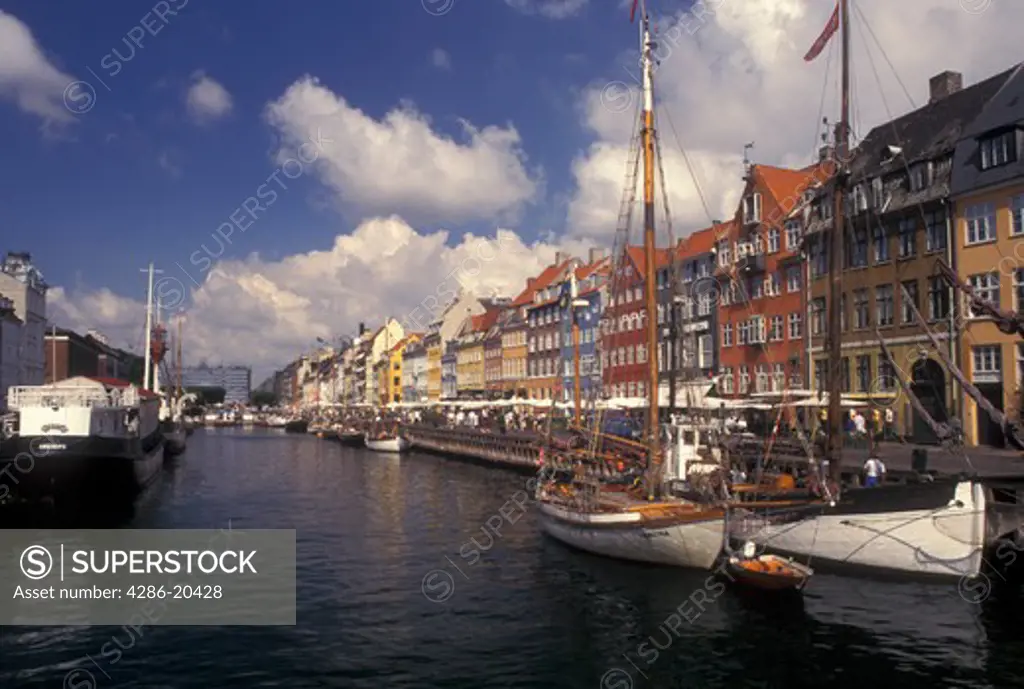 Copenhagen, Denmark, canal, Scandinavia, Sjaelland, Europe, Boats docked along Nyhavn (New Harbor) in the scenic city of Copenhagen