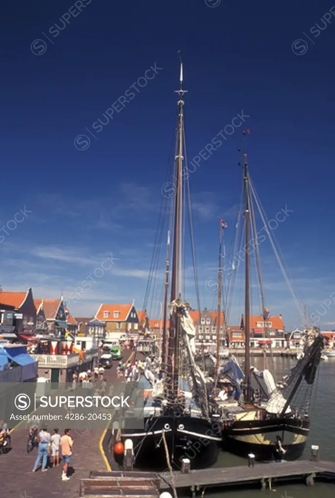 Netherlands, Holland, Volendam, Noord-Holland, Europe, Waterfront on the harbor on Markermeer in the town of Volendam.