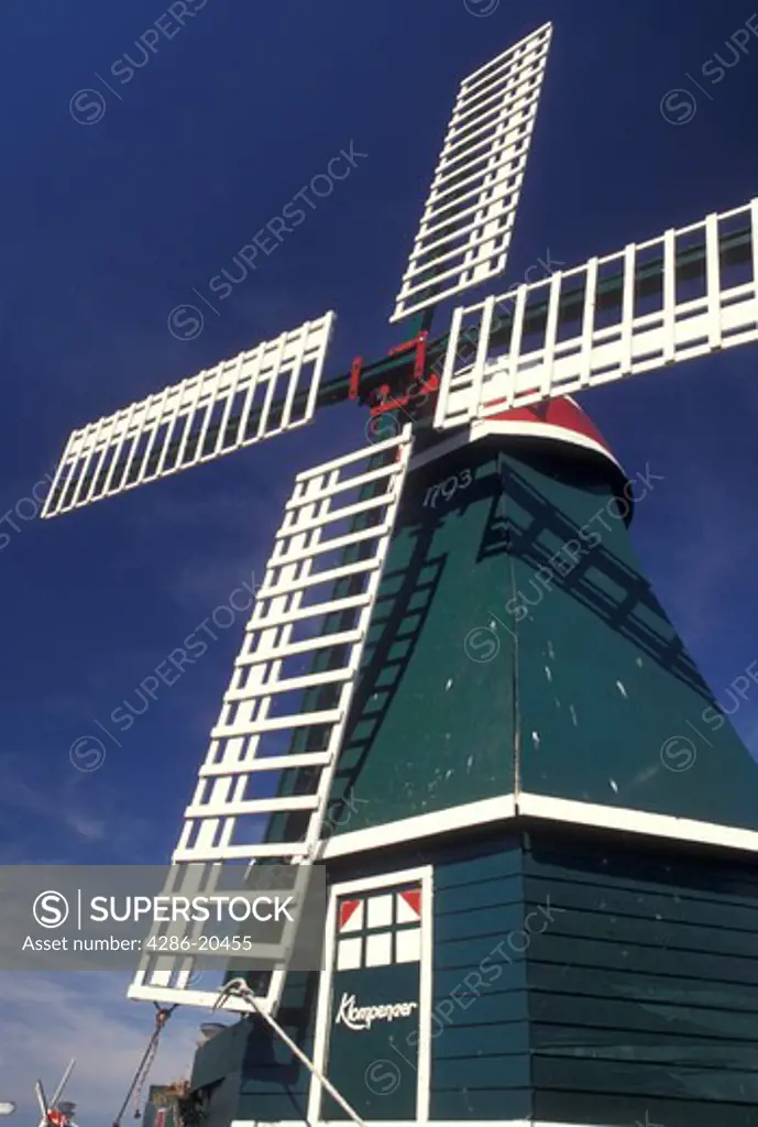 windmill, Holland, Volendam, Netherlands, Noord-Holland, Europe, Green and white windmill in the town of Volendam.