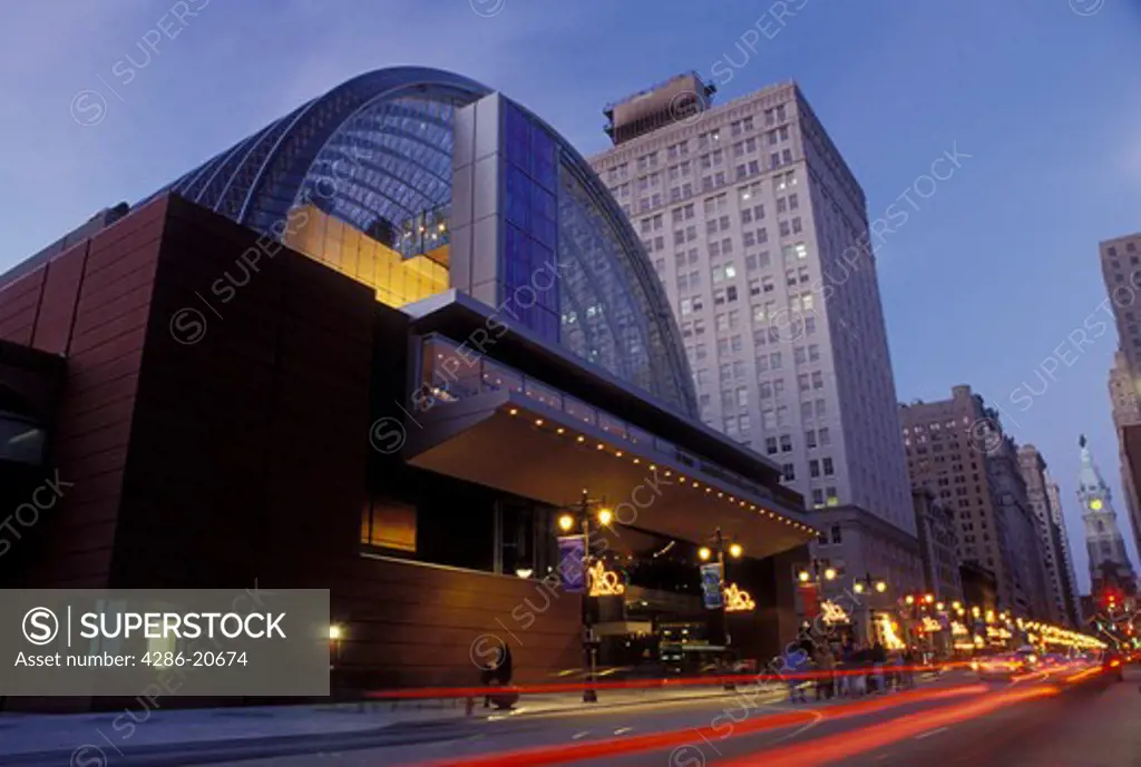 Philadelphia, PA, Pennsylvania, The Kimmel Center for the Performing Arts along Broad Street in downtown Philadelphia in the evening.