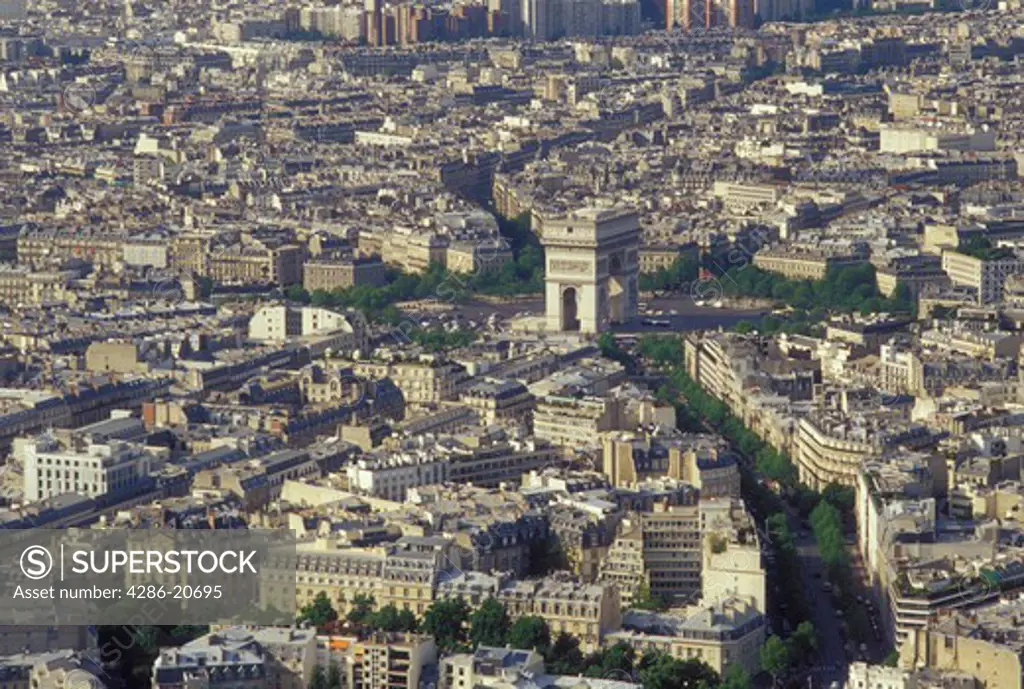 Paris, Ile de France, France, Europe, Aerial view of the city of Paris and the Arc de Triomphe looking North from the Eiffel Tower.