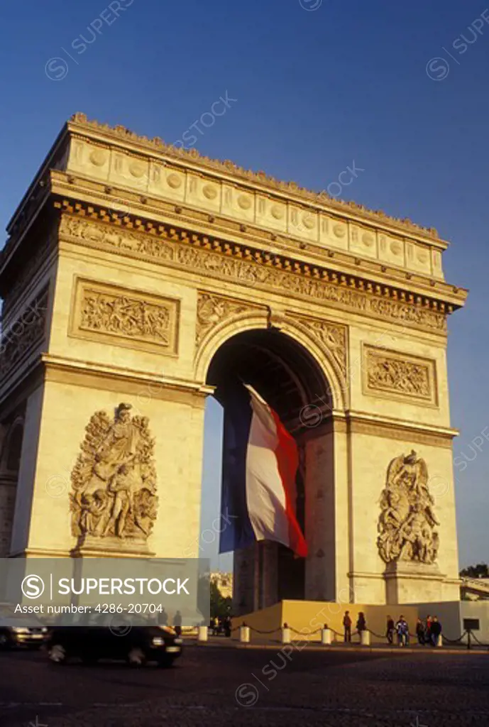 Arc de Triomphe, France, Paris, Ile de France, Europe, The French Flag hangs inside the Arc de Triomphe in Paris at Place Charles de Gaulle Etoile.