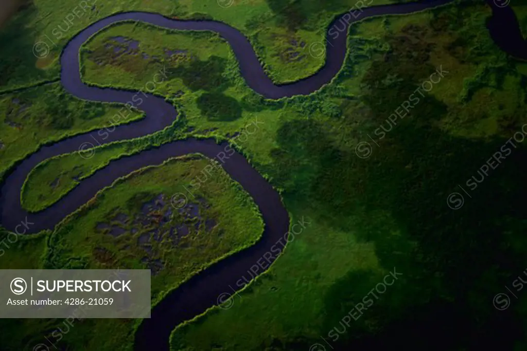 Aerial view of a winding waterway running through the marshes of the Chesapeake Bay.