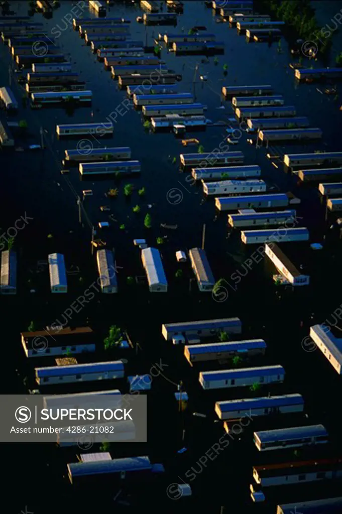Aerial of trailers being flooded by the Mississippi River.