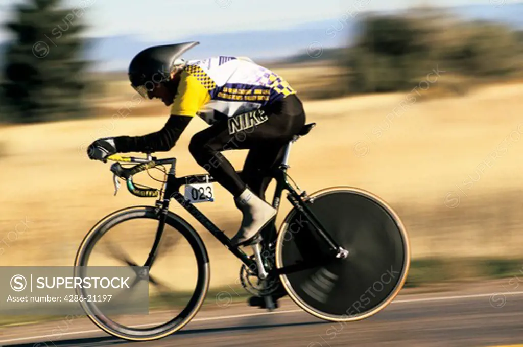Speed-blurred image of racing Senior Games bicyclist, Enterprise, Utah.