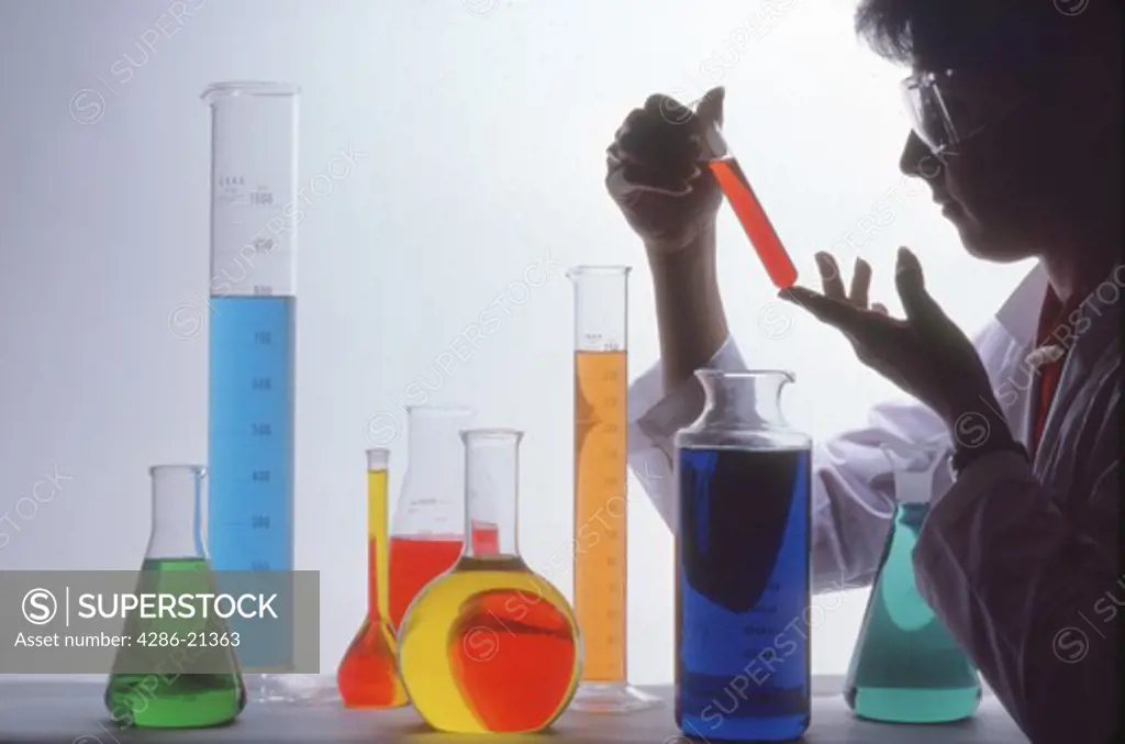 Chemist with fluids and containers 
