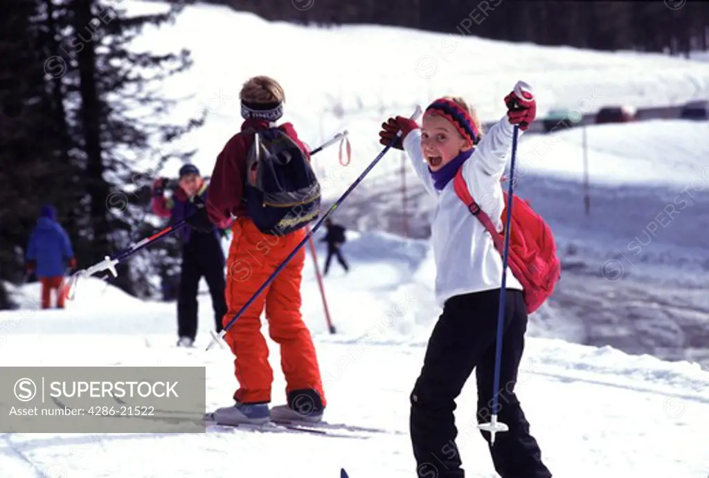 A happy child cross country skiing at Mount Hood Meadows, OR.