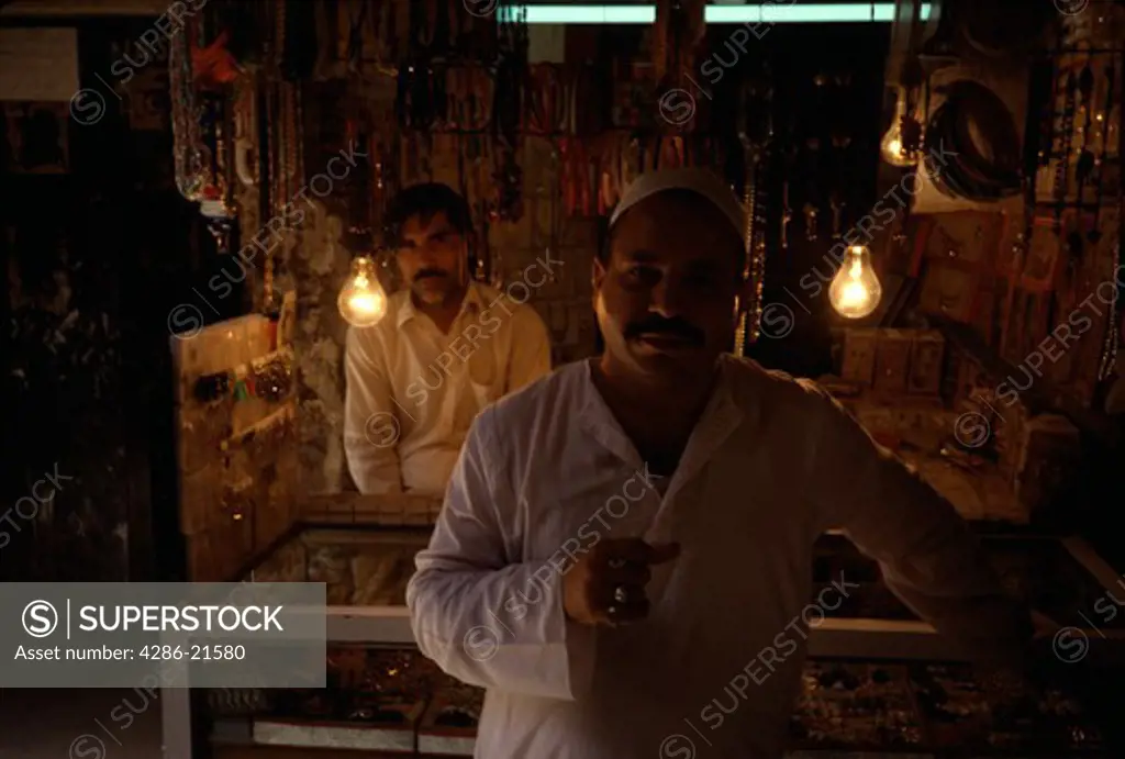 Two Pakistanis in their jewelry store in Rowalpindi.