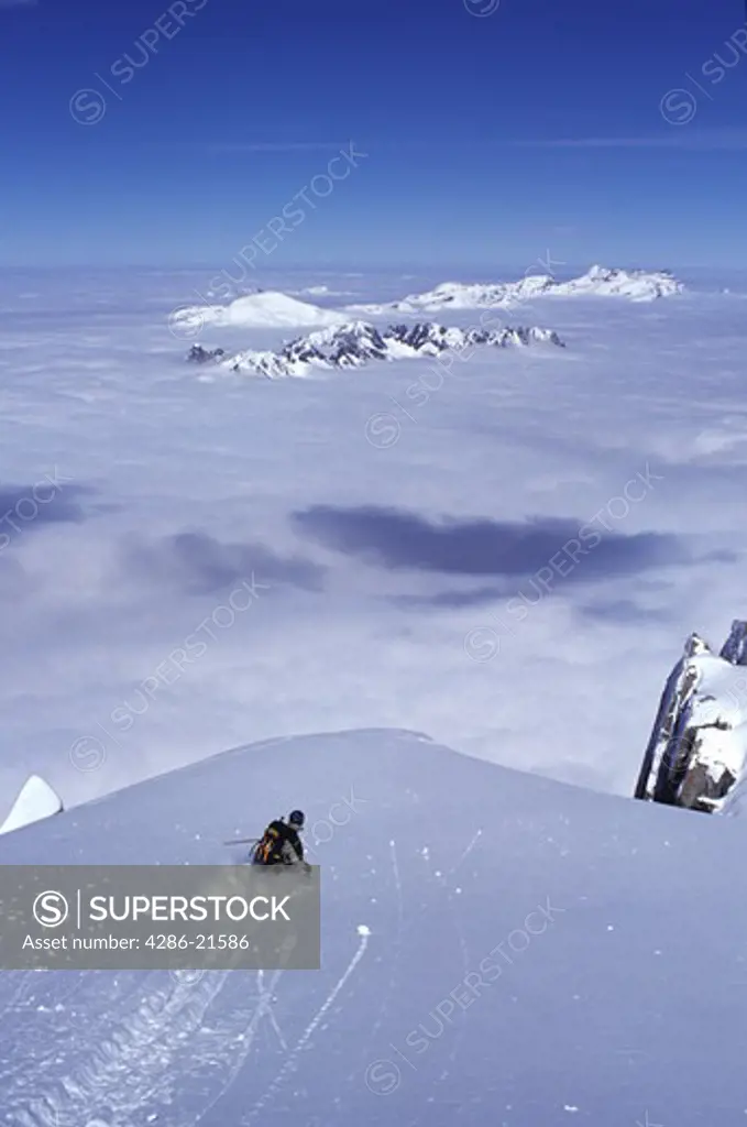 A man skiing powder snow at Chamonix, France.