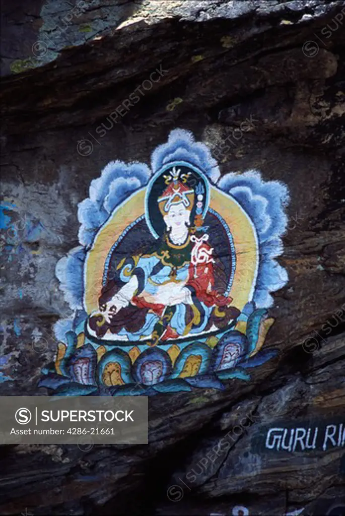 A Buddhist painting on a cliff near Mount Everest.