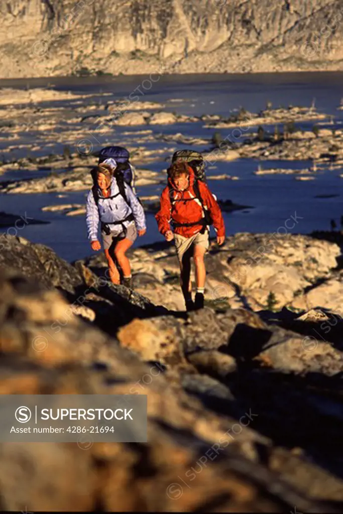 A couple backpacking in Desolation Wilderness near Lake Tahoe, CA.