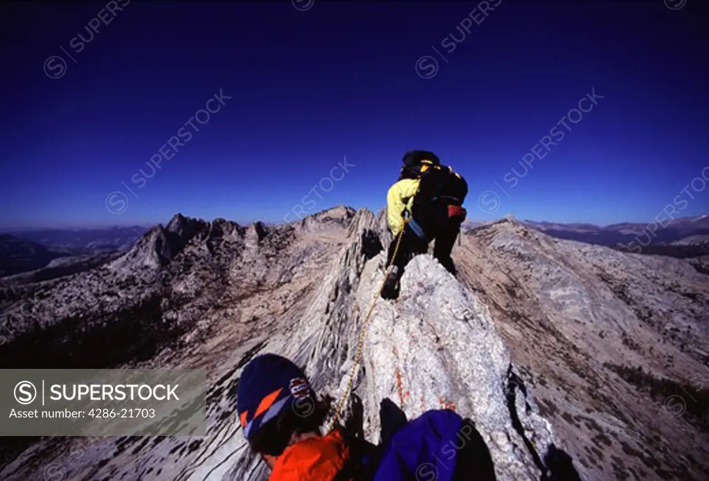 Two men mountaineering on Matthis Crest, CA.
