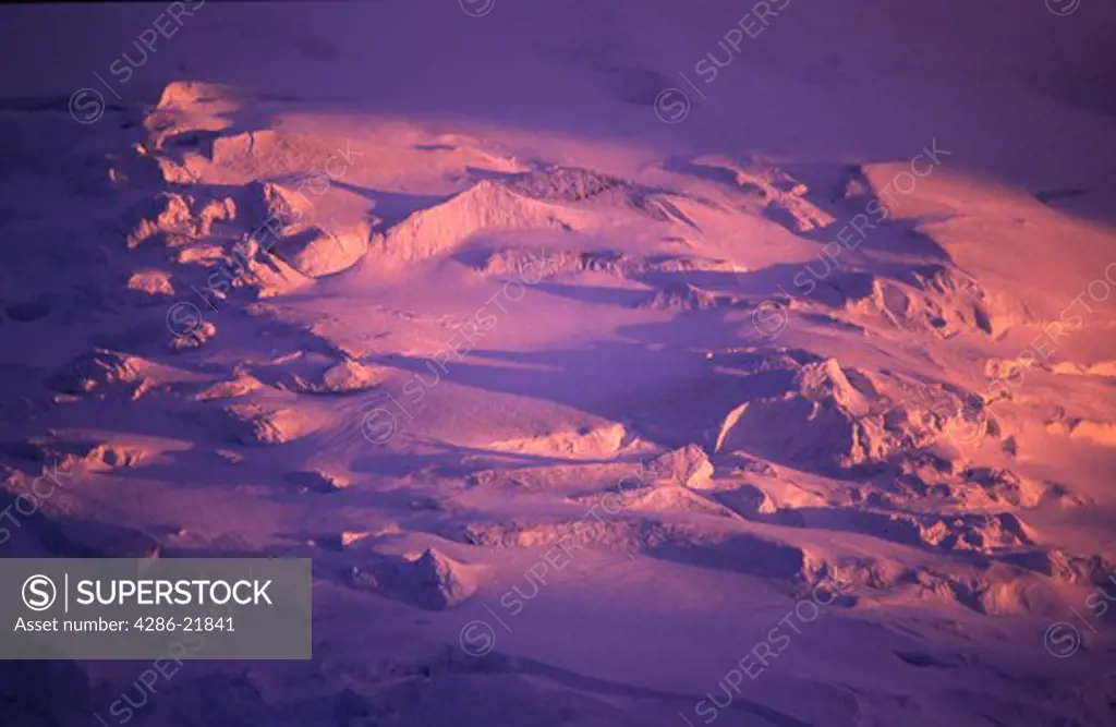 Alpenglow on an ice fall on Mount Crosson. AK.