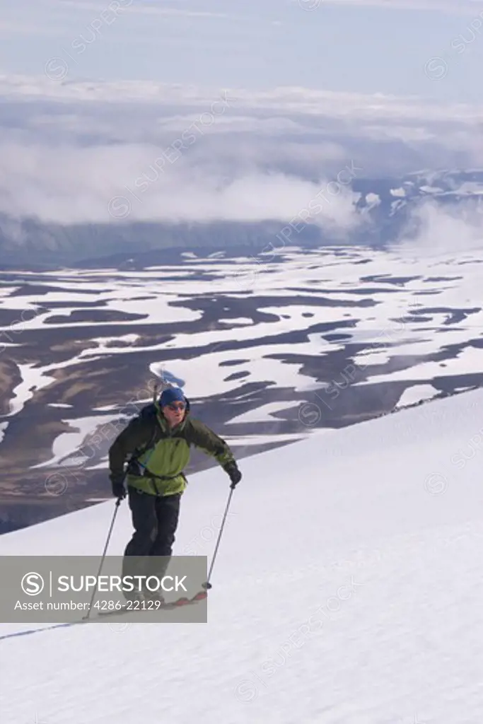 A skier climbing Mount Vsevidov in Alaska.
