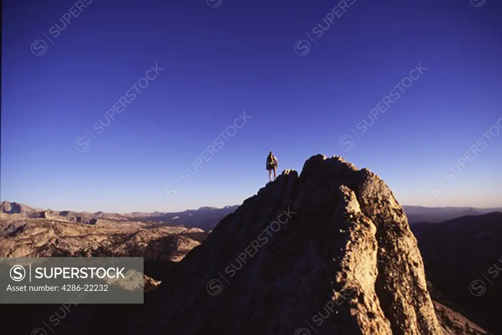 A man mountaineering on Bear Creek Spire, CA.