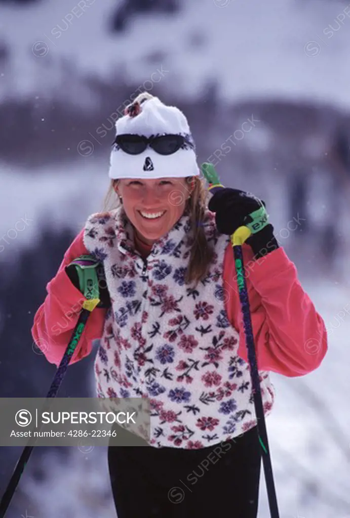 A woman cross country skiing at Sundance, UT.