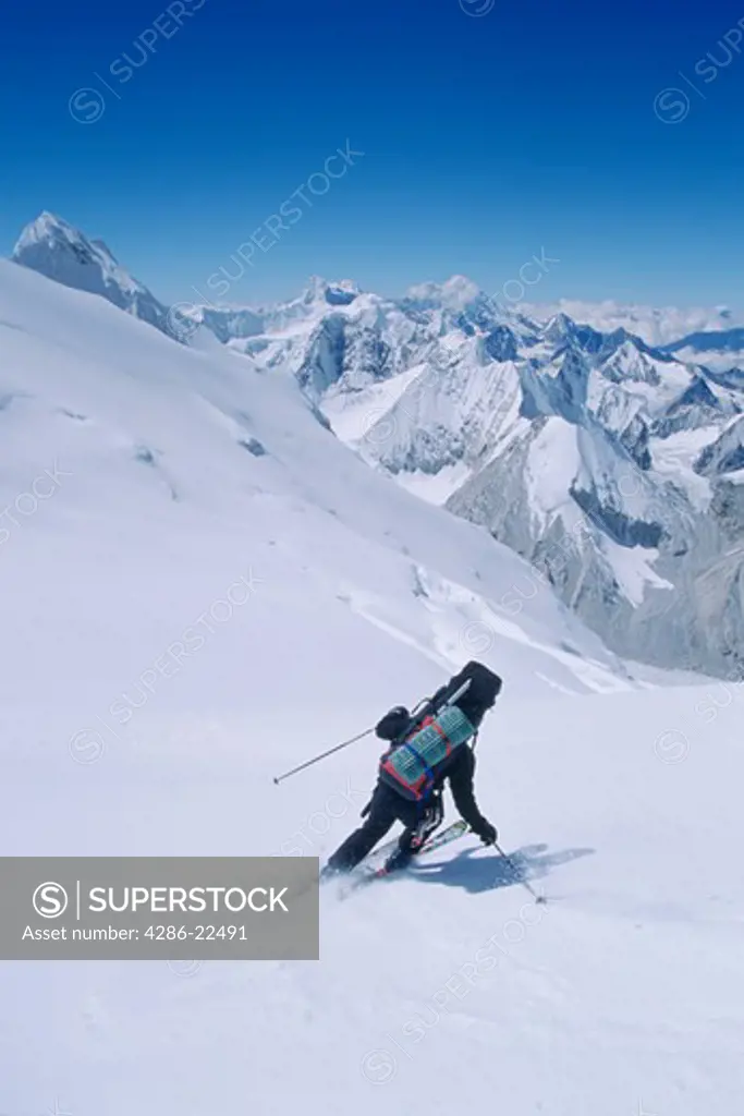 A Man Skiing in the Himalaya on Mount Cho Oyu at 23,000 Feet.