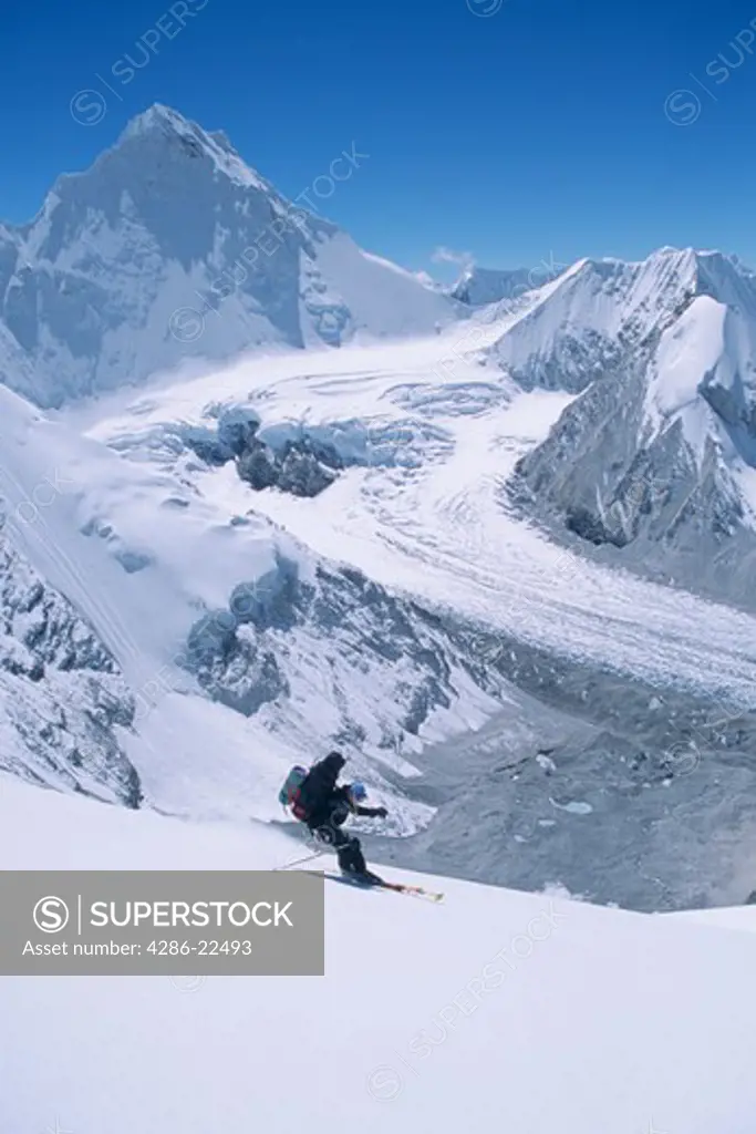 A Man Skiing in the Himalaya on Mount Cho Oyu at 23,000 Feet.