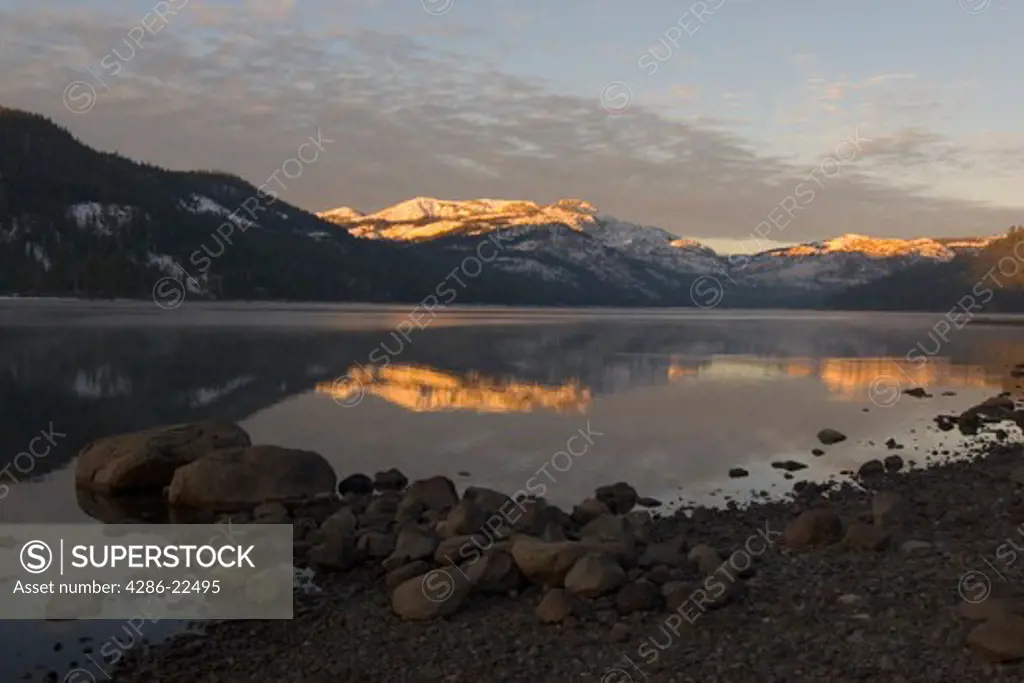 Snowy Mountains at Dawn Reflecting on Donner Lake in Truckee California