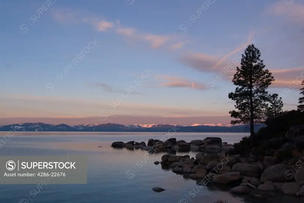 The west shore of Lake Tahoe at dawn from the east shore