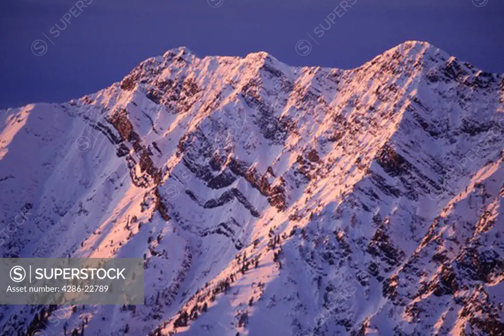 Dawn light on the Wasatch mountains in Little Cottonwood Canyon in Utah.