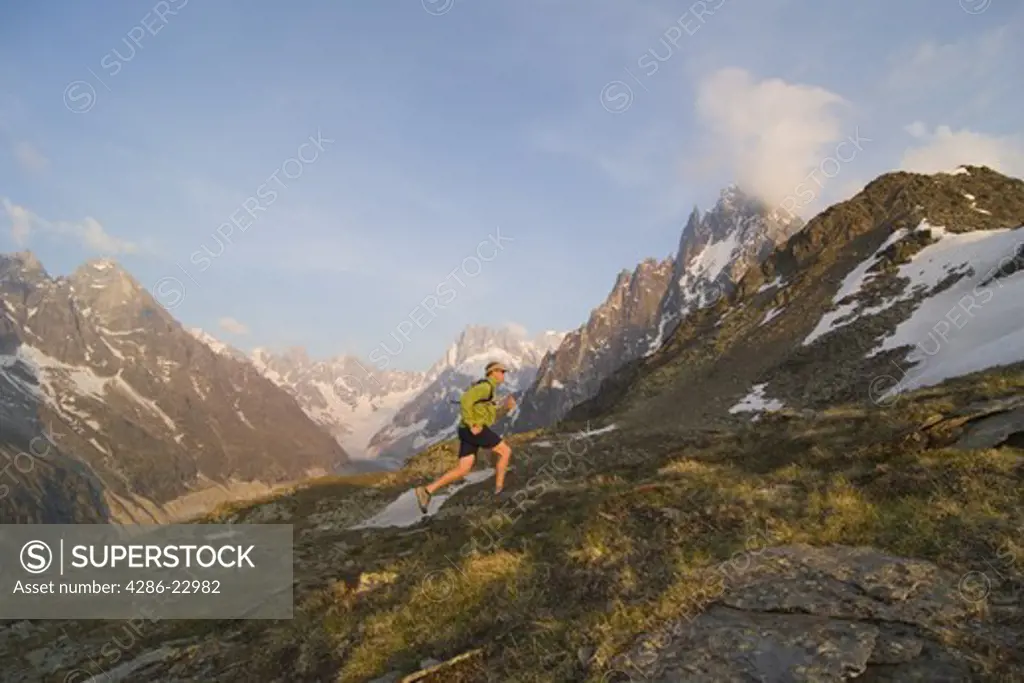 A man running in the French Alps near Chamonix France.