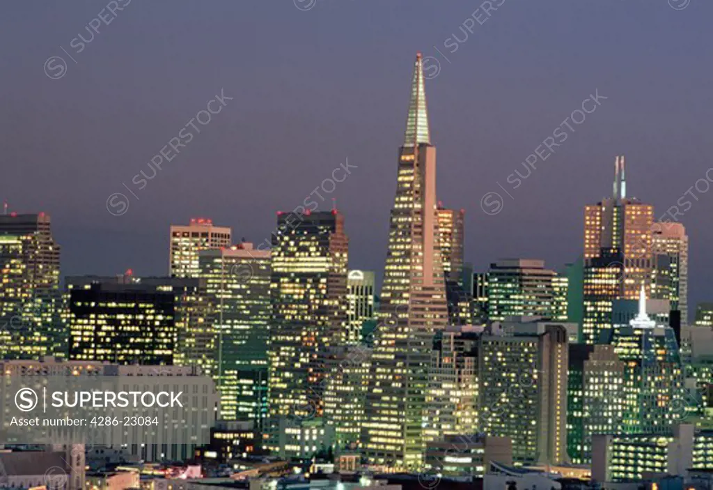 Buildings and skyscrapers in San Francisco skyline at dusk, California.