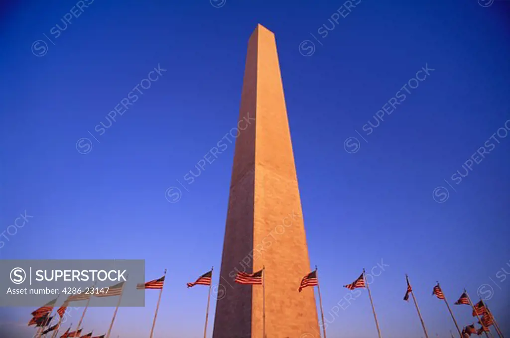 Washington Monument surrounded by a circle of US flags U S A Washington DC