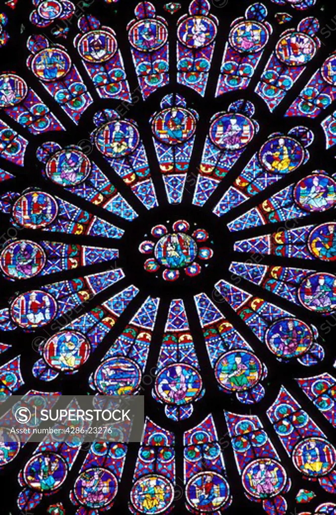 France Paris Notre Dame North Rose Window 13th century stained glass window depicting the Virgin Mary encircled by figures of