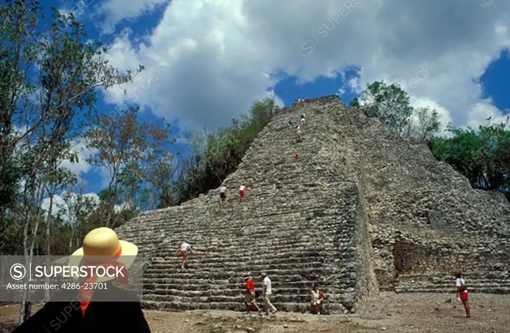 Mexico Coba tourists at El Castillo or Nohoch Mul