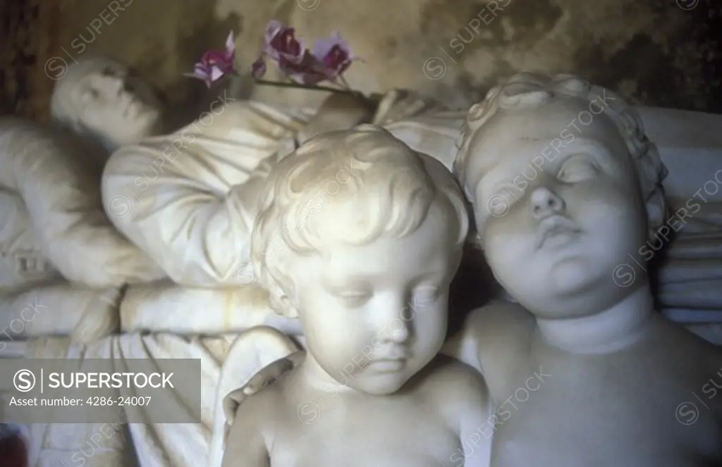 Italy, Fiesole, statues in cemetery