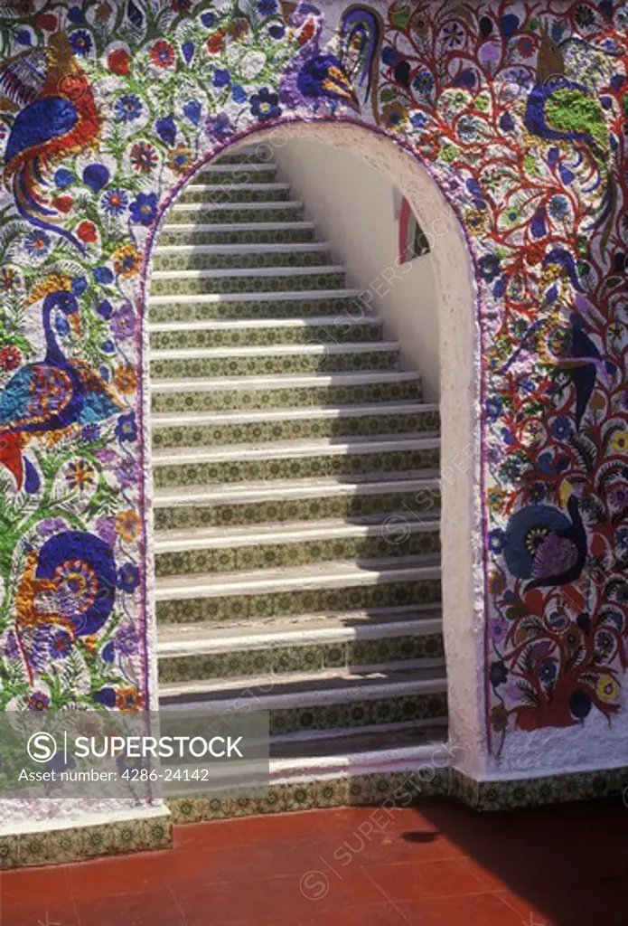 Mexico, Acapulco, colorful doorway with steps leading upward