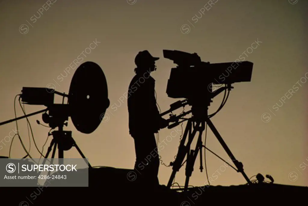 Silhouetted Cameraman