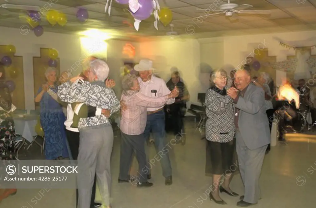 Elderly couples dancing in local clubhouse in Arizona USA