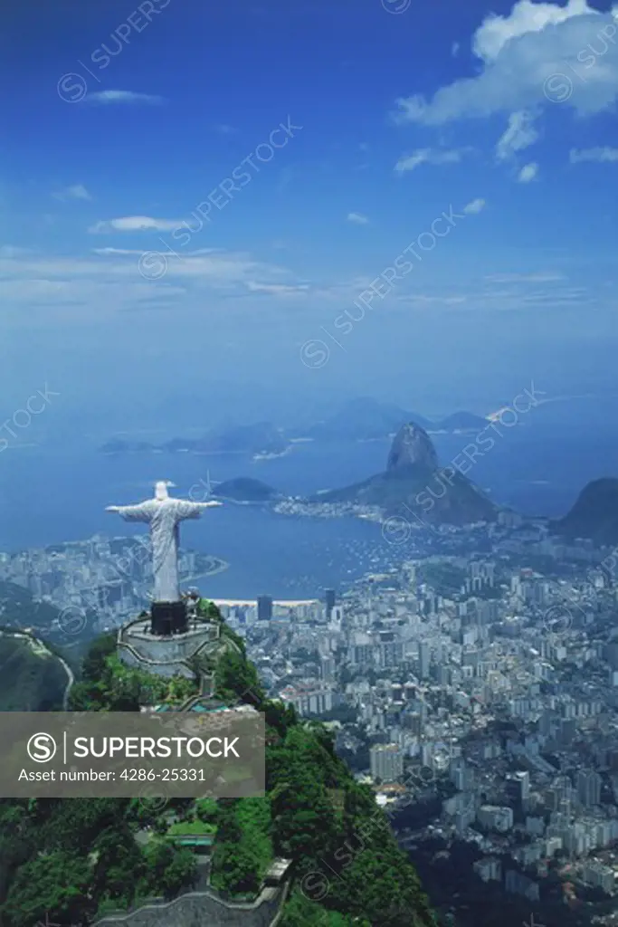 Aerial view of Mount Corcovado with Rio and Sugar Loaf below