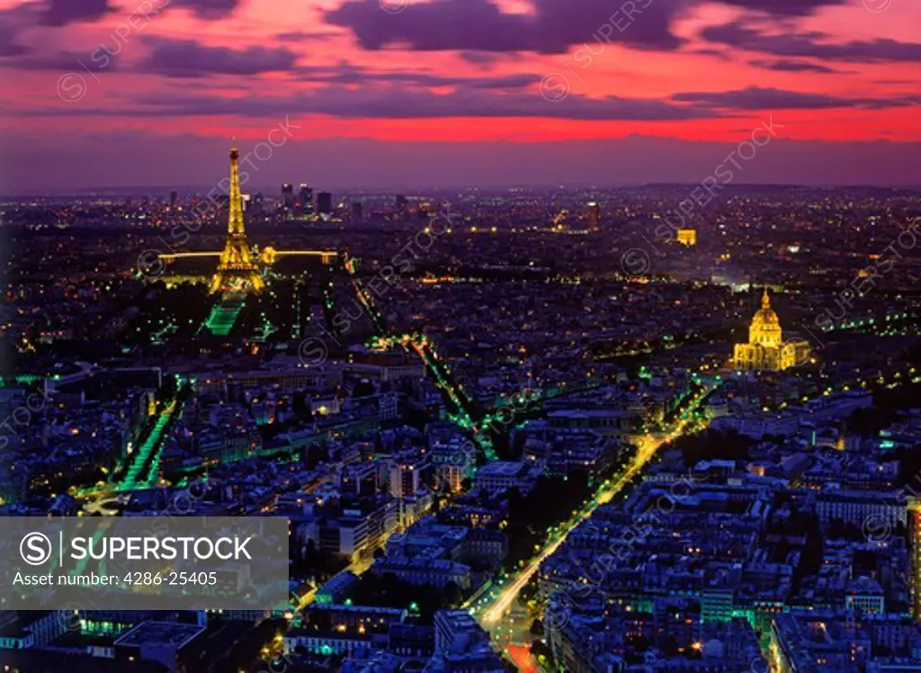 Overview of Paris at dusk with Hotel Invalides Eiffel Tower and Arc de Triomphe