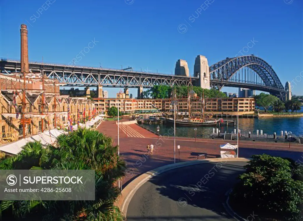 Campbells Cove on The Rocks with Harbor Bridge at sunrise in Sydney