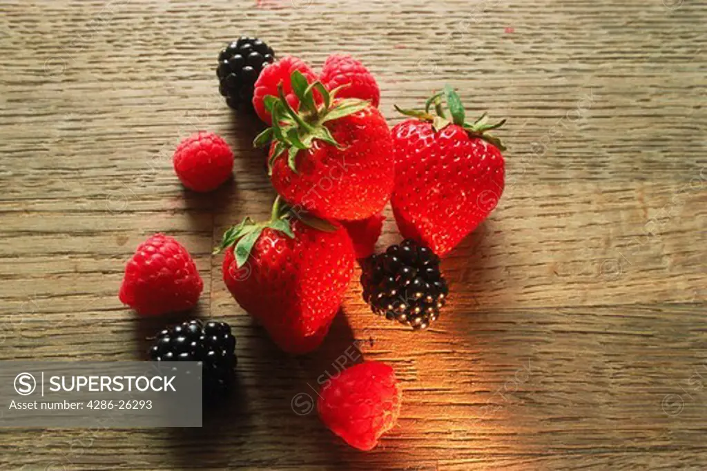 Raspberries and strawberries and blackberries