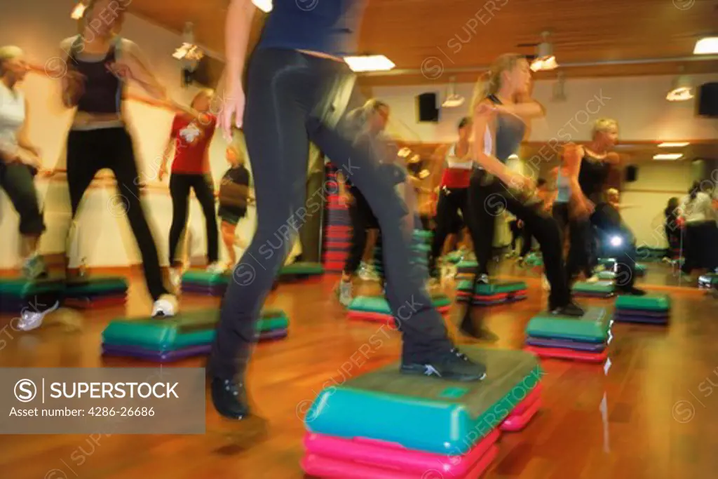 Indoor step aerobics or stepping classes 