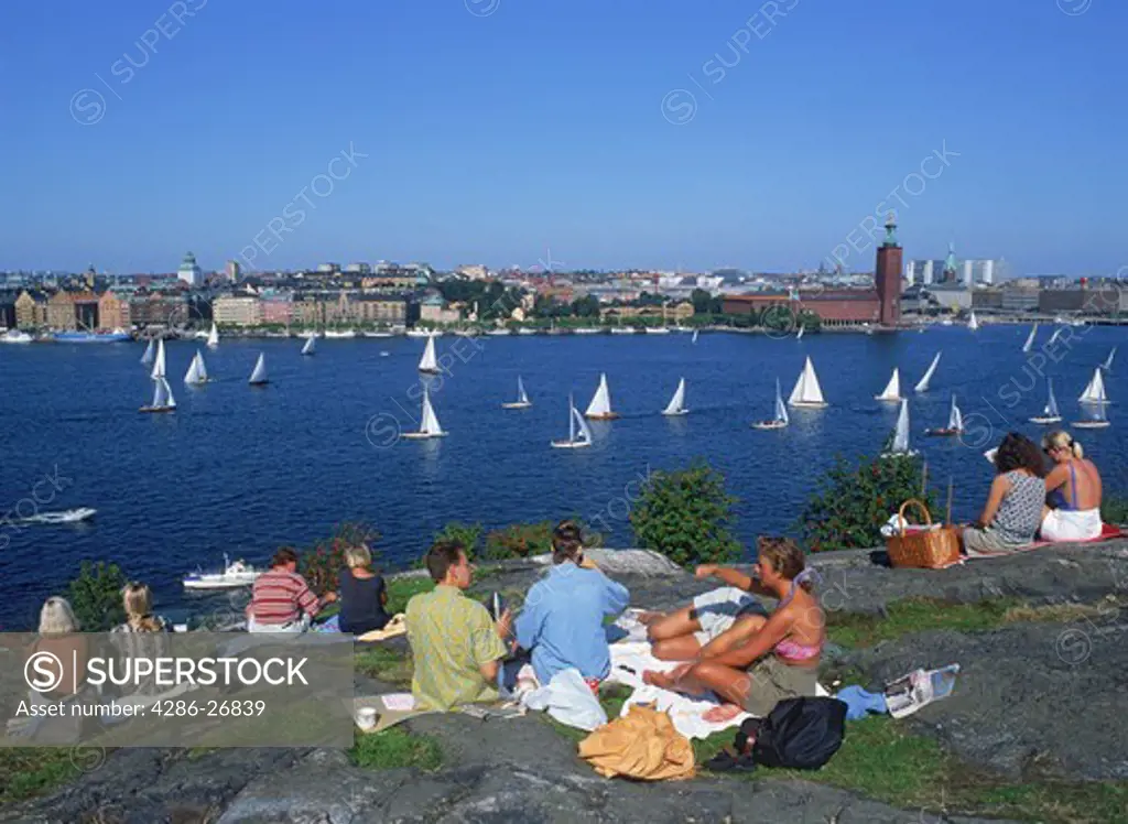 Summer picnicing and sailing in Stockholm