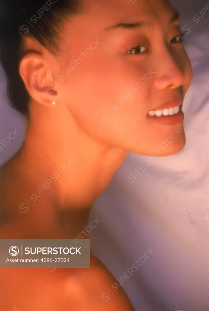 Profile of beautiful Asian woman