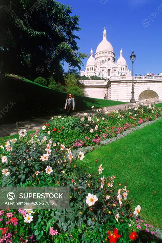 Flowers and tourists at Sacr Coeur in Paris