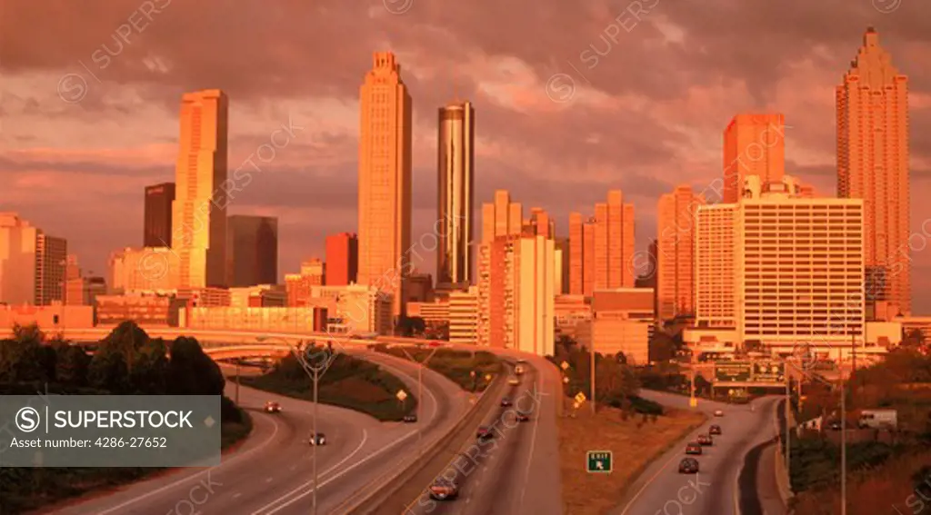 Atlanta skyline in sunset light above highways Georgia  USA