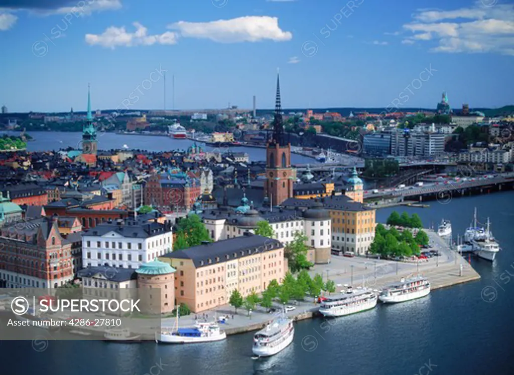 Overview of Riddarholmen Island with yachts and Gota Canal boats from City Hall in Stockholm