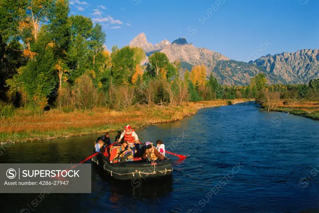 River rafting down the Snake River below the Grand Tetons in Wyoming in autumn