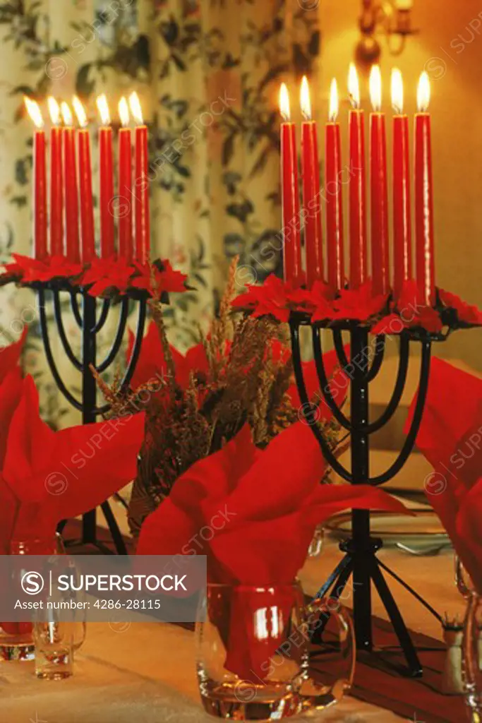 Red candles help brighten Christmas holidays