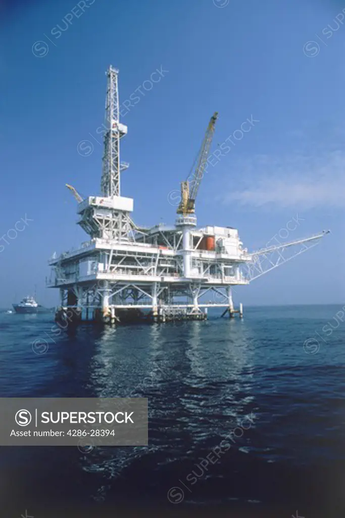 Supply boat at offshore oil rig off  Huntington Beach, California
