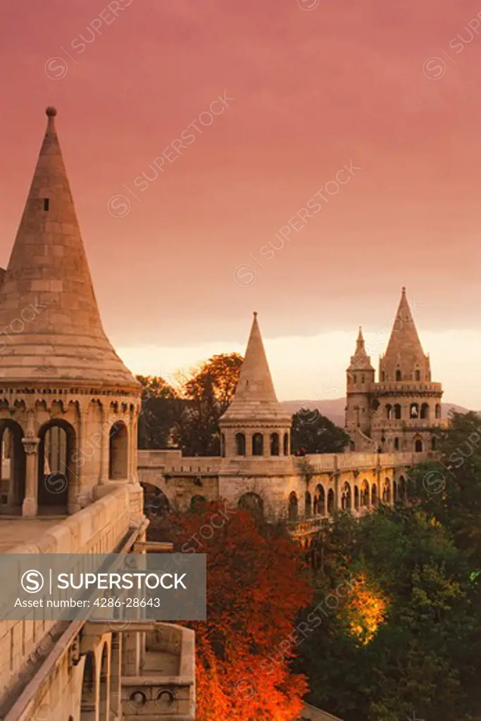 Walls of Fisherman's Bastion (Var) in Budapest, Hungary at dusk