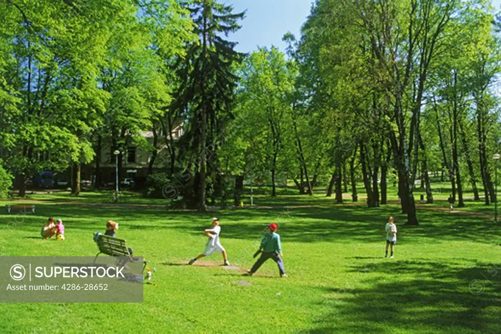 Kids and mothers in Helskinki park in summer