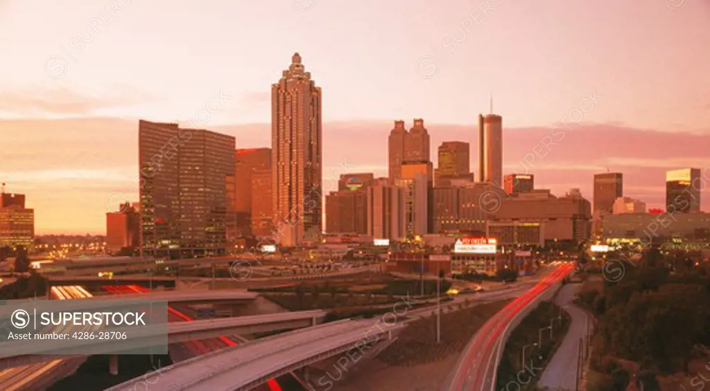 Flowing traffic on highways around Atlanta at sunset